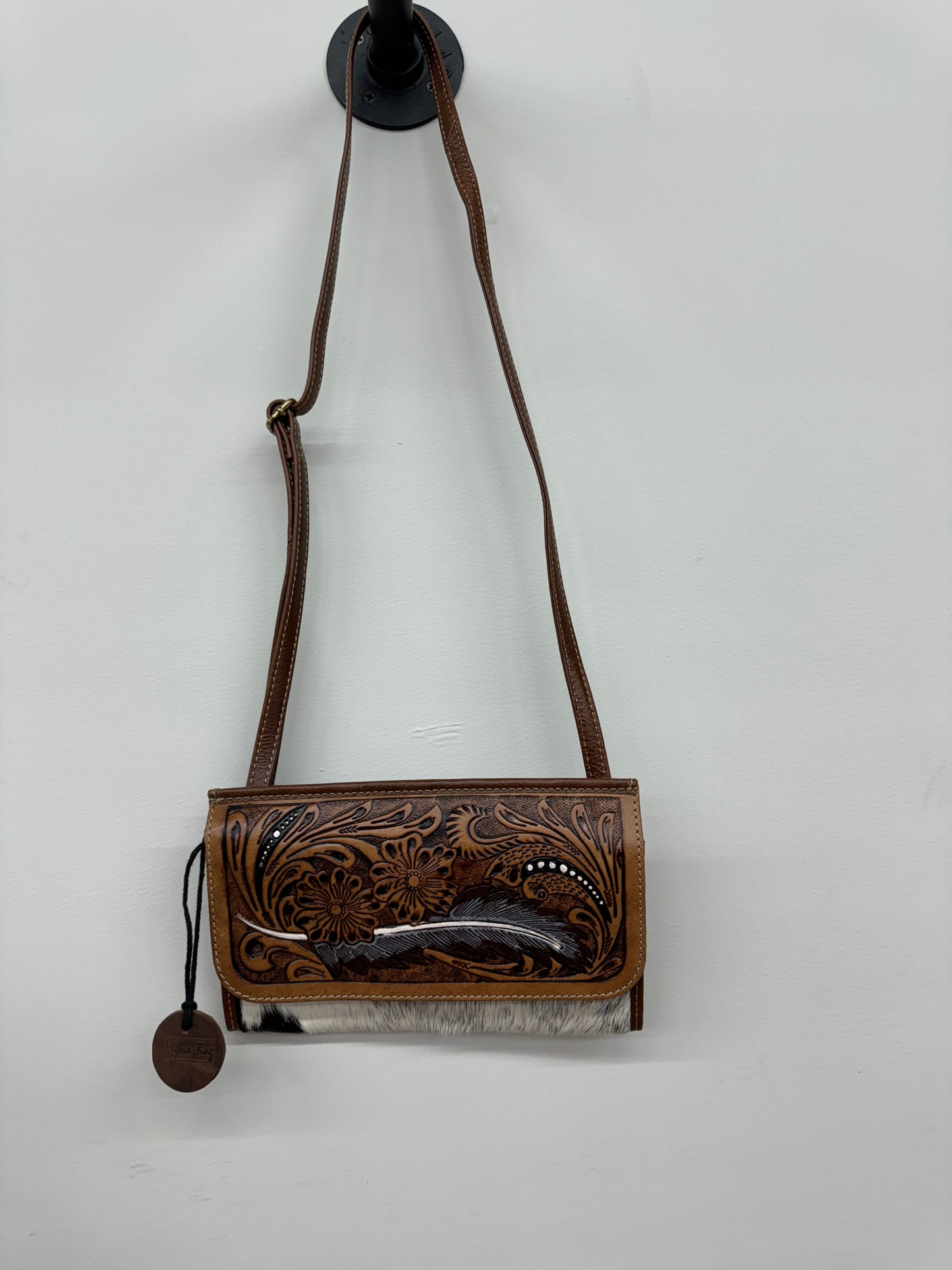 Feather point tooled bag