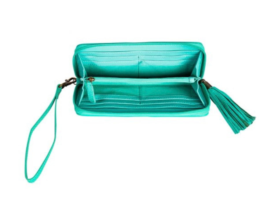 Turquoise hair on leather wallet